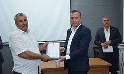Baraj suları altında kalan köyün hak sahiplerine 18 yıl sonra tapuları teslim edildi